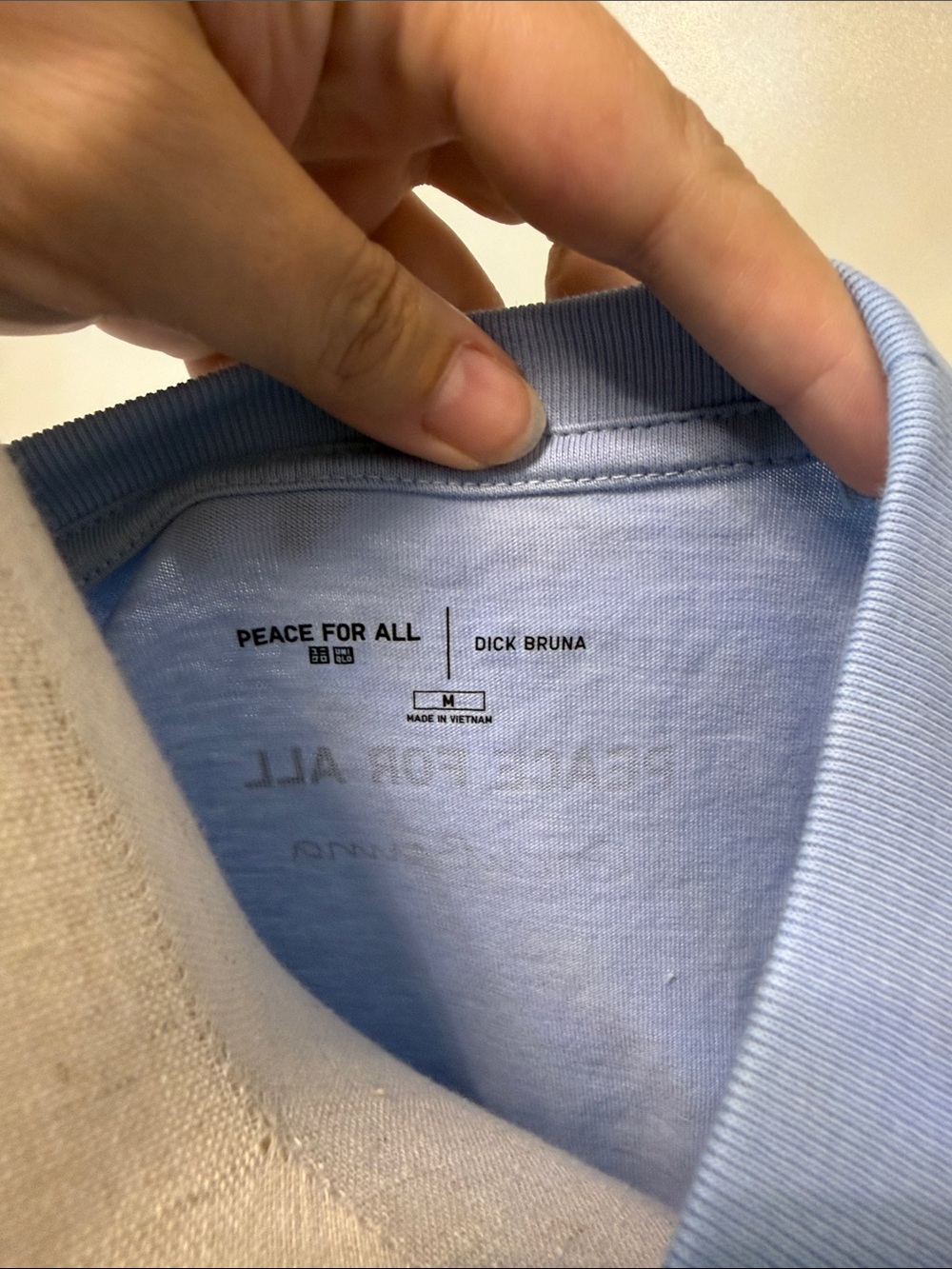 Uniqlo Light Blue Short Sleeve Tee with Bunny on Earth Graphic - Picture 2 of 5